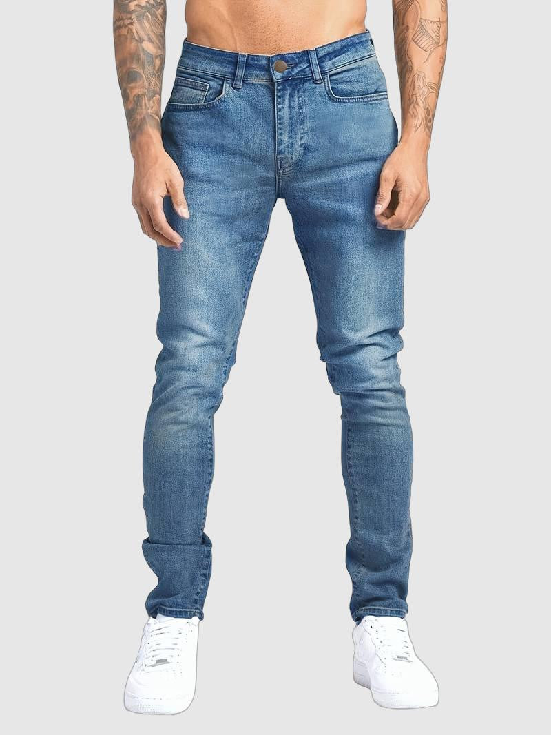 Menโs slim fit tapered denim jeans with mid rise waist and 5 pocket design for casual and smart casual wear