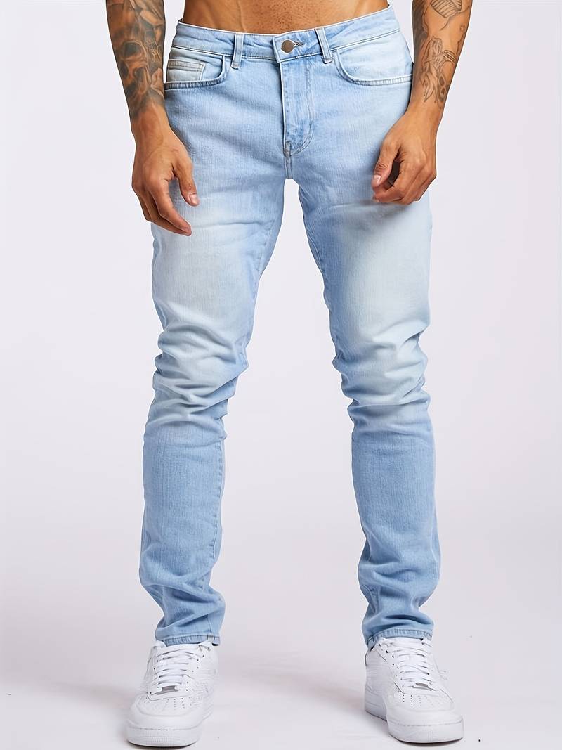 Menโs slim fit tapered denim jeans with mid rise waist and 5 pocket design for casual and smart casual wear