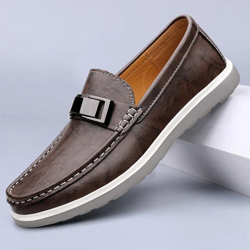 Menโs slip on loafers with metal bar detail moccasin stitching and chunky rubber sole for casual and smart casual wear