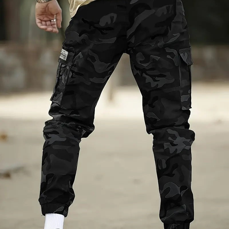 Men’s durable camo cargo work pants with multiple pockets, straight-leg fit, and rugged cotton-polyester fabric for work, outdoor activities, and everyday wear.