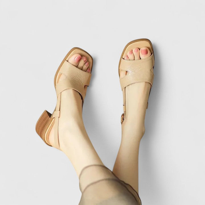 Women wearing square toe block heel sandals with minimal straps