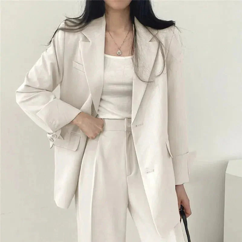 Women blazer and wide leg trouser suit set with high waist pants and structured fit for office workwear