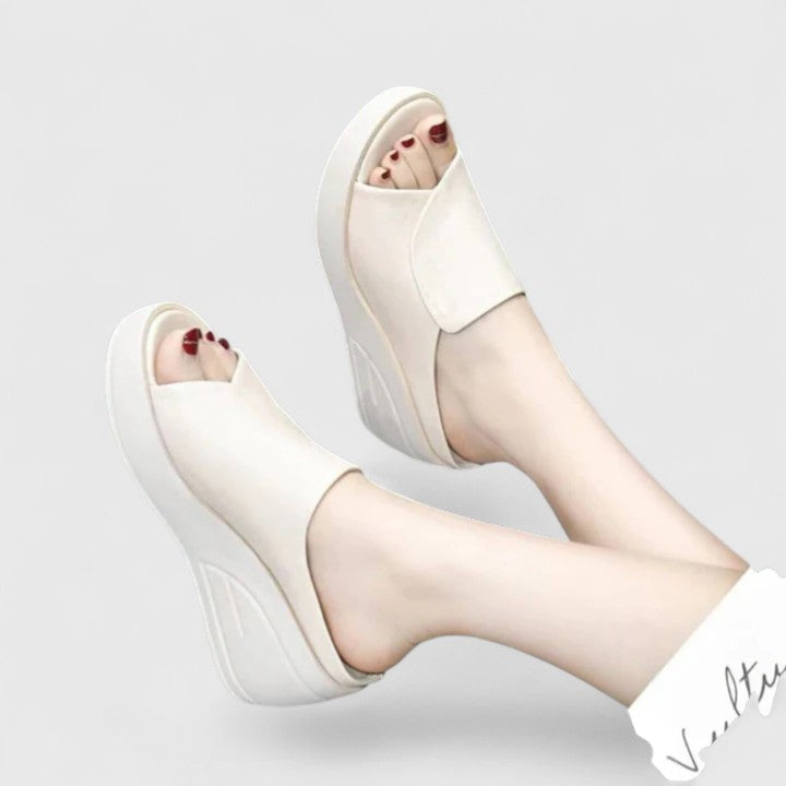 Women’s wedge sandals with cushioned sole and arch support