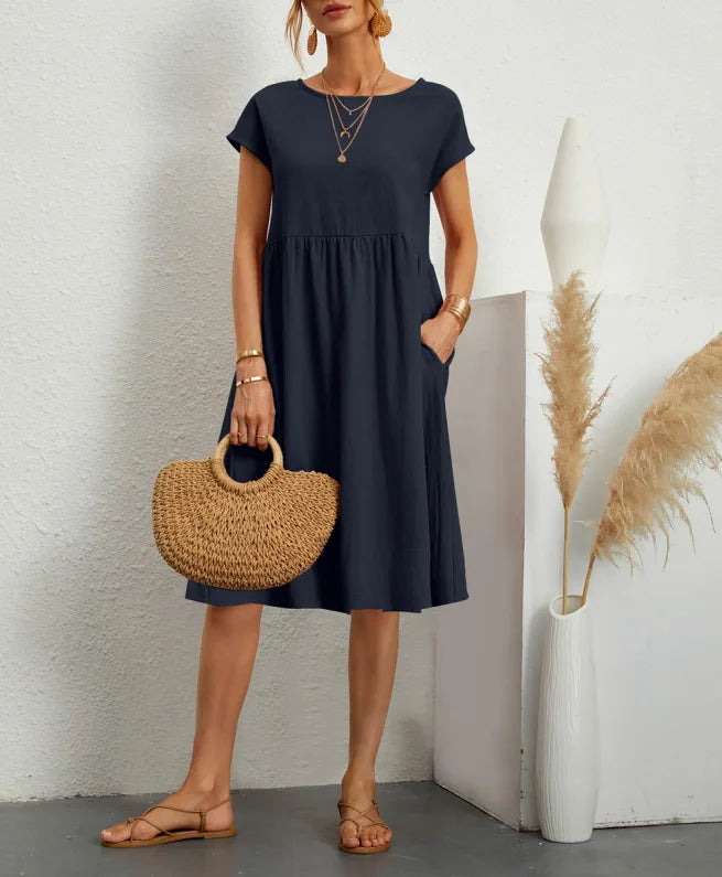 Women wearing a relaxed fit cotton linen vintage summer dress with breathable fabric for warm weather