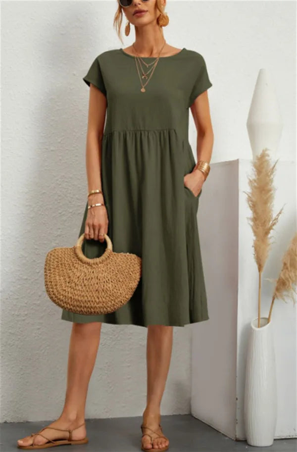 Women wearing a relaxed fit cotton linen vintage summer dress with breathable fabric for warm weather