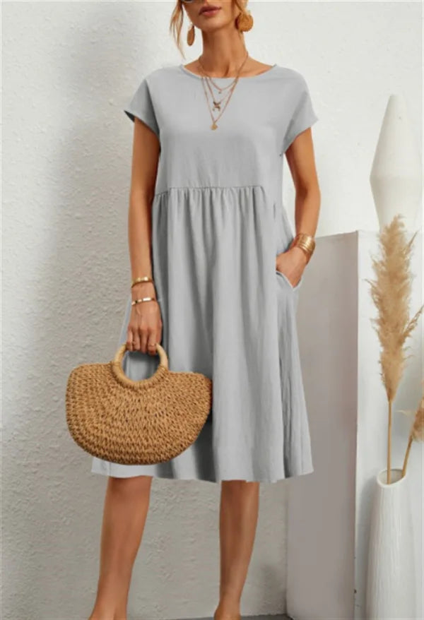 Women wearing a relaxed fit cotton linen vintage summer dress with breathable fabric for warm weather