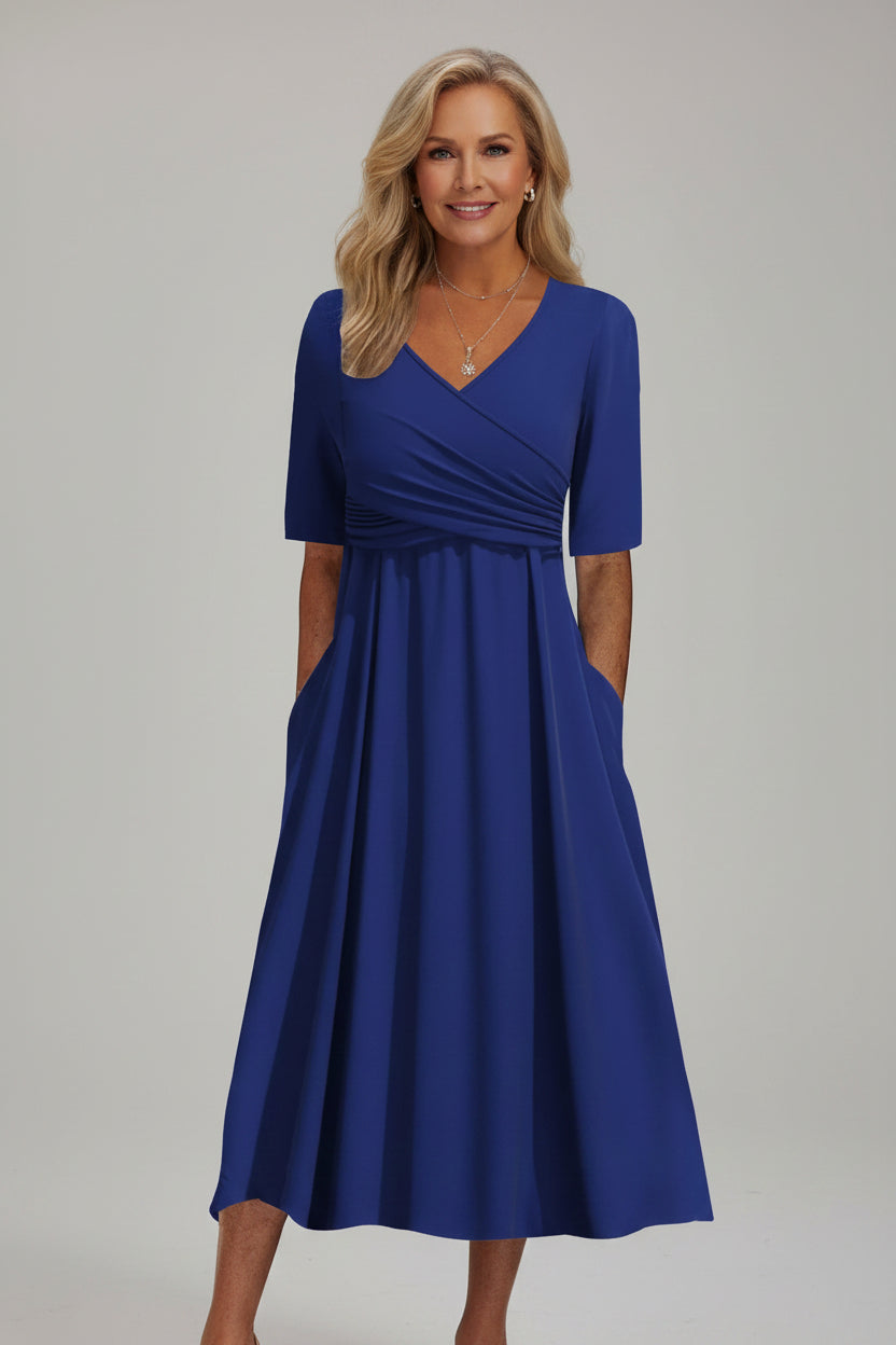 Women’s A-line V-neck spring dress in cotton blend fabric with pockets and relaxed fit silhouette