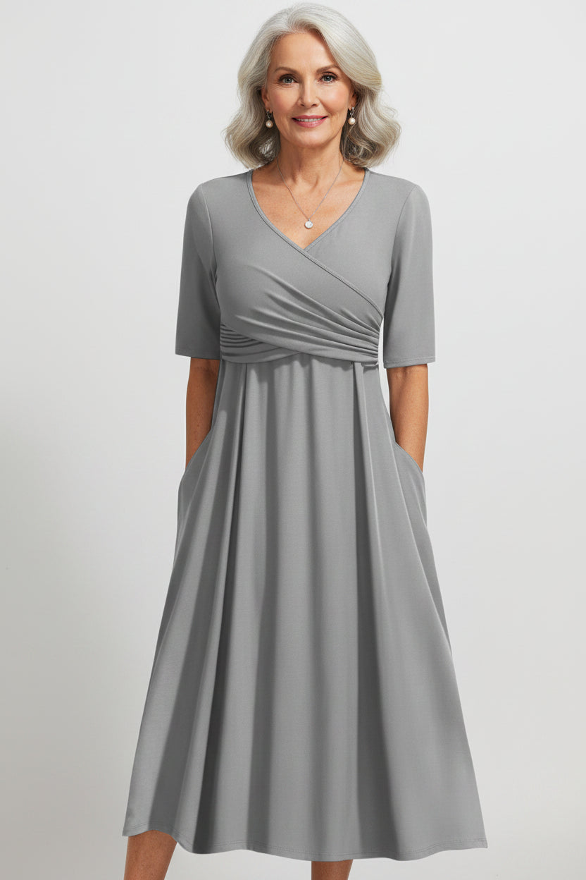 Women’s A-line V-neck spring dress in cotton blend fabric with pockets and relaxed fit silhouette
