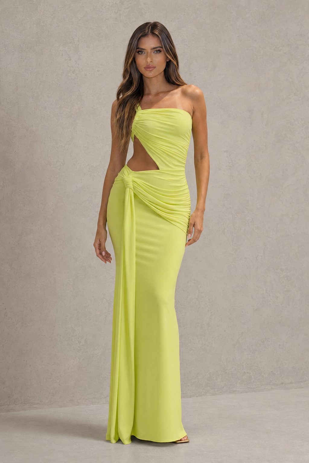 Womenโs asymmetric cut-out jersey maxi dress with sculptural neckline, fitted silhouette and elegant wrap-style floor-length skirt.