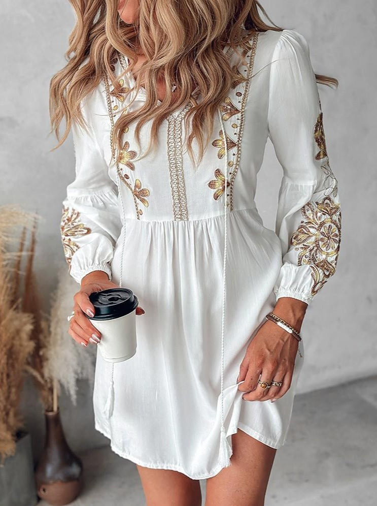 Women’s boho midi dress with floral embroidery and tie detail, relaxed fit and flowy silhouette