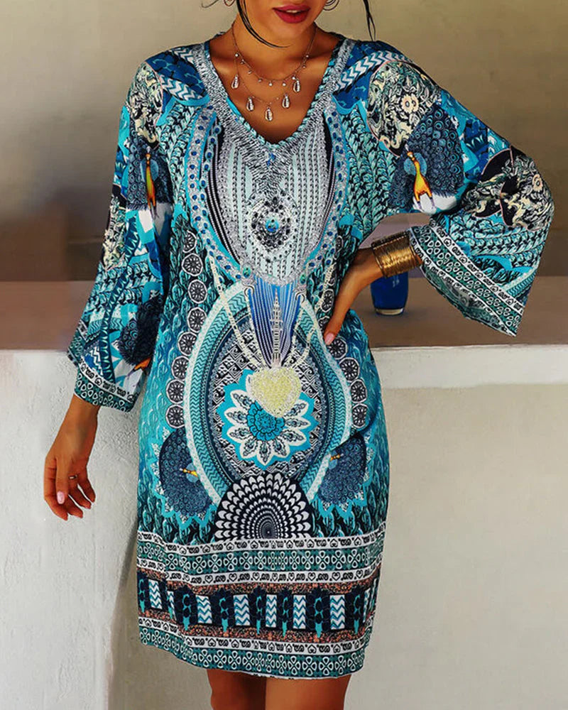 Womenโs boho print long sleeve mini dress with relaxed flowy fit and lightweight fabric for casual wear