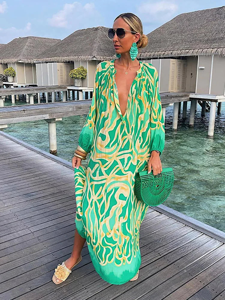 Women’s boho print maxi dress with deep V neck and long sleeves in ankle length silhouette