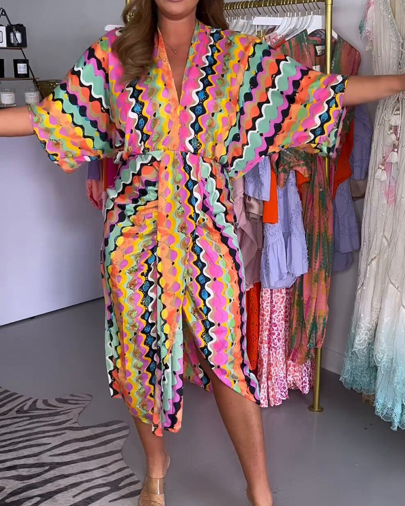 Women’s colorful geometric print V-neck midi dress with half sleeves