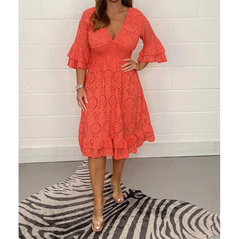 Women’s midi dress with anglaise embroidery, ruffles, and flowing sleeves