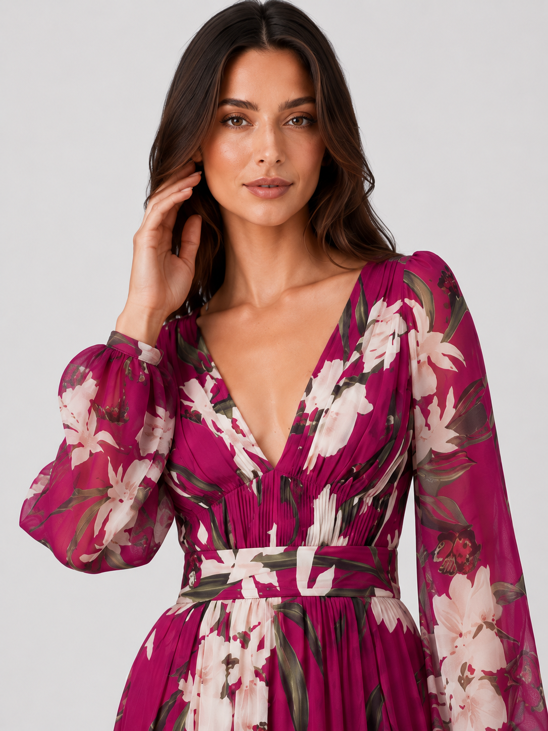 Woman wearing a lightweight floral chiffon maxi dress with a flowing, relaxed silhouette. The dress features an all-over floral print and breathable fabric that drapes softly for comfortable movement. Suitable for warm-weather occasions, casual outings, daytime events, and holiday wear.