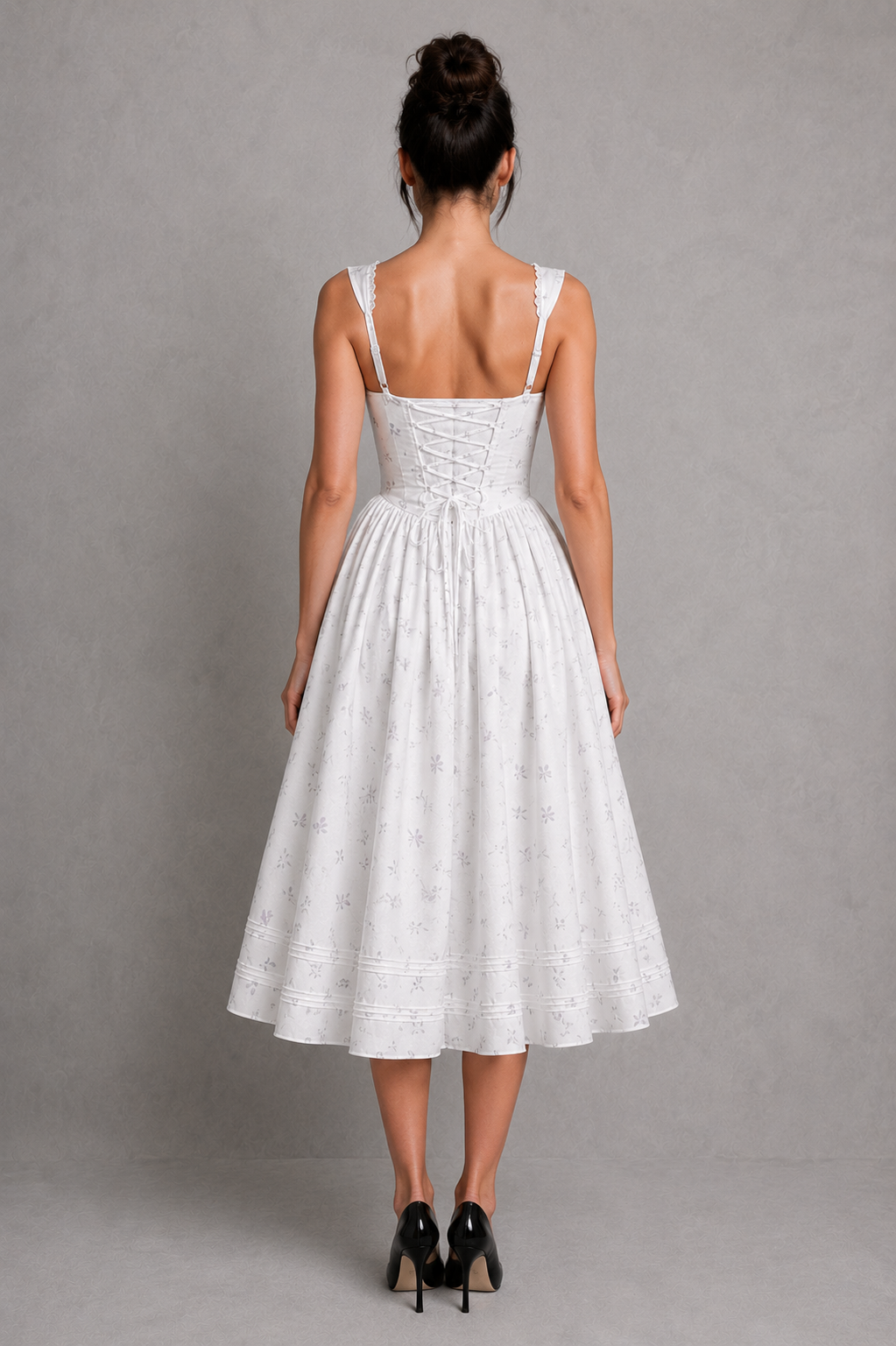 Women’s floral cotton midi dress featuring a square neckline, fitted pintuck bodice, front button closure, lace trim detailing, adjustable lace-up back, and a full voluminous midi skirt in a romantic bridal-inspired silhouette.