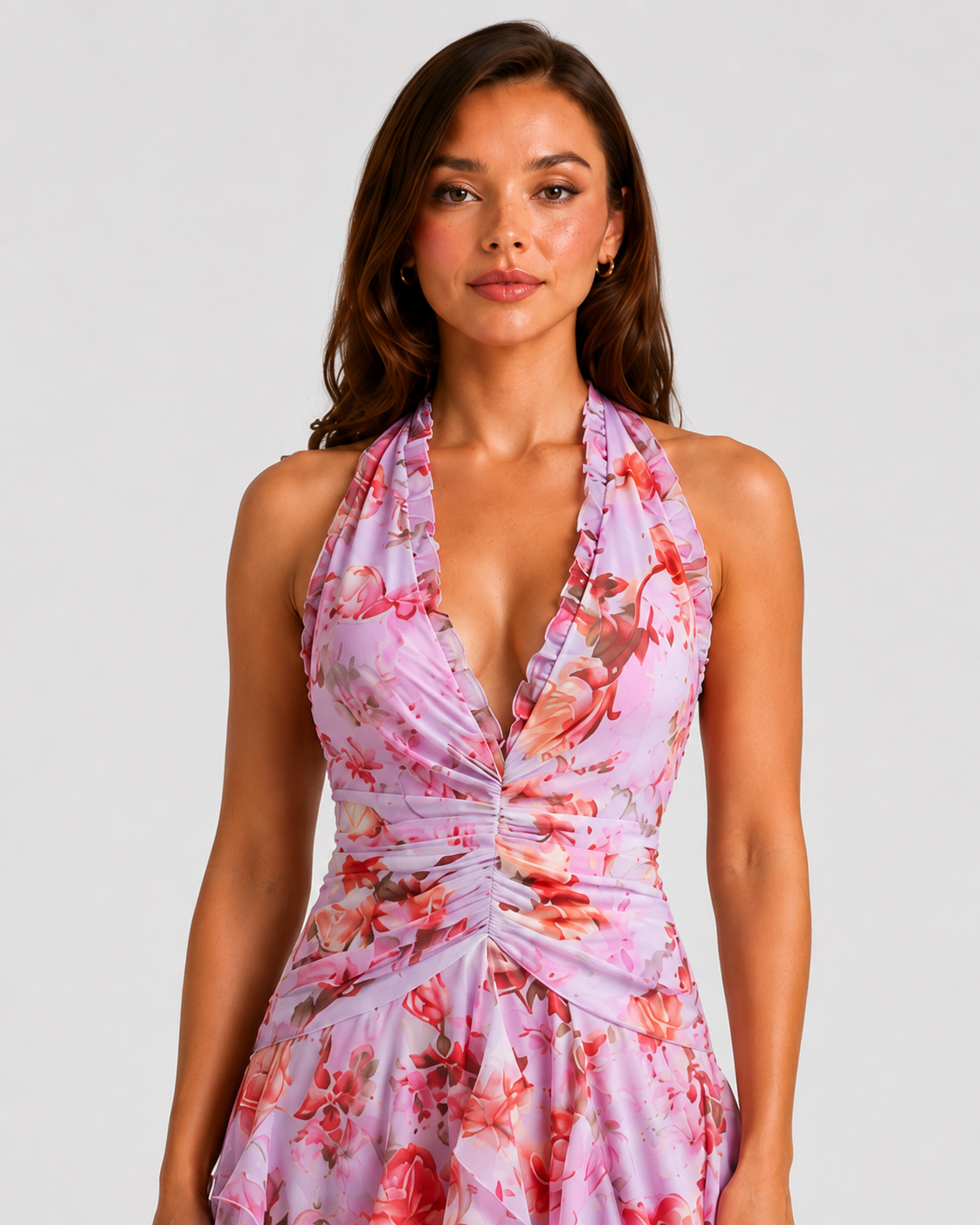 Women’s floral halter maxi dress featuring a gathered halter neckline, ruched waist, and flowing tiered skirt, ideal for weddings, garden parties, and summer events.