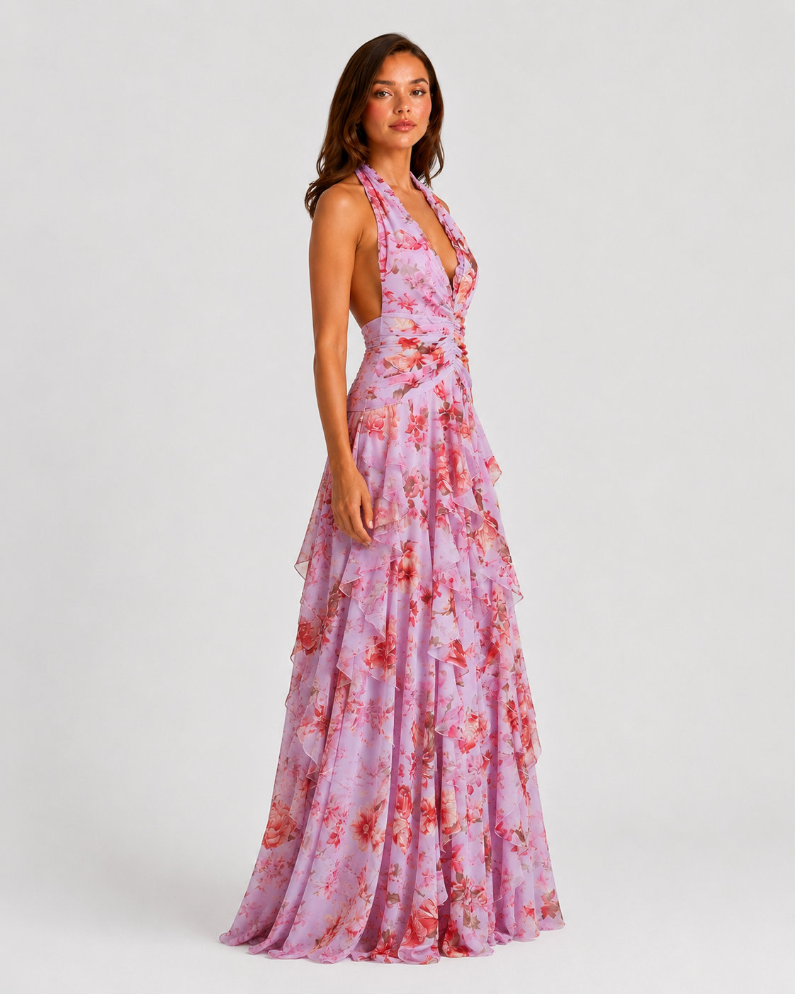 Women’s floral halter maxi dress featuring a gathered halter neckline, ruched waist, and flowing tiered skirt, ideal for weddings, garden parties, and summer events.