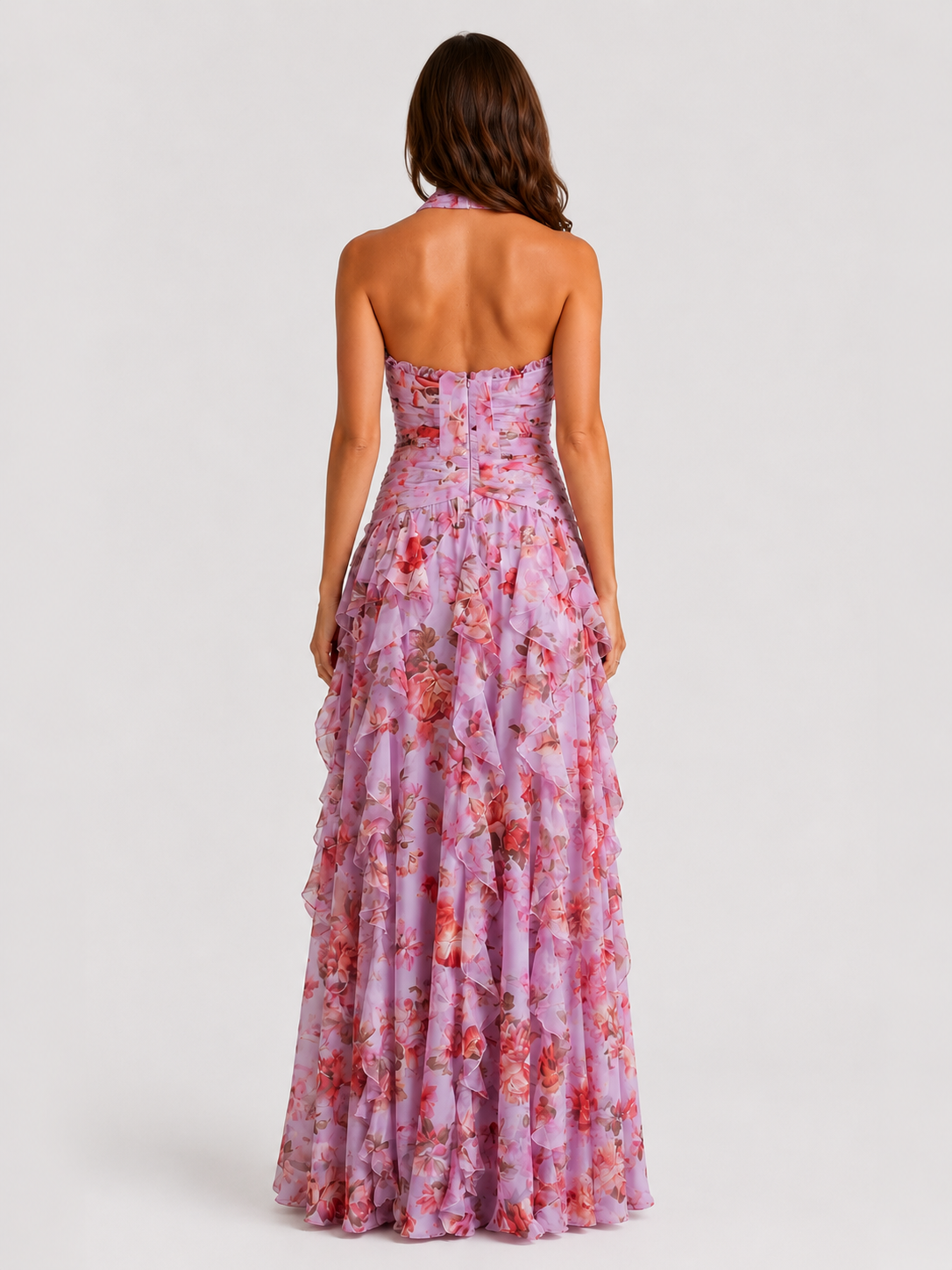 Women’s floral halter maxi dress featuring a gathered halter neckline, ruched waist, and flowing tiered skirt, ideal for weddings, garden parties, and summer events.