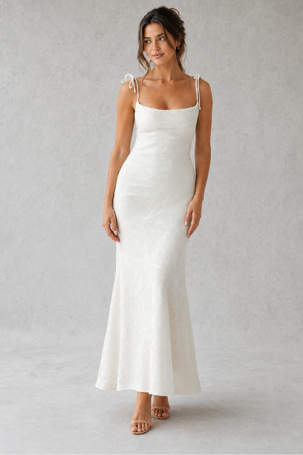 Women's floral jacquard maxi dress featuring a soft cowl neckline, adjustable tie shoulder straps, and a figure-skimming bias-cut silhouette. Elegant textured floral fabric creates graceful movement, making it ideal for evening events, weddings, formal occasions, and special celebrations.