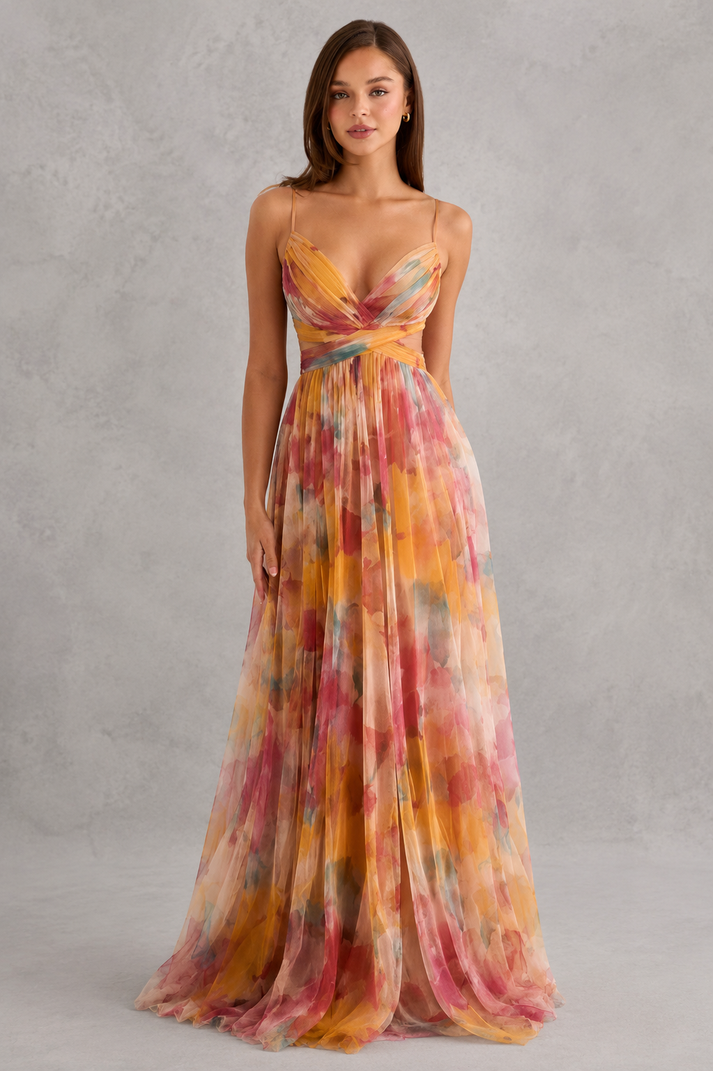 Womenโs floral maxi dress by Klyne Studios featuring a flowing full-length silhouette, adjustable tie-back detail, lightweight breathable fabric, and relaxed fit for warm-weather styling.