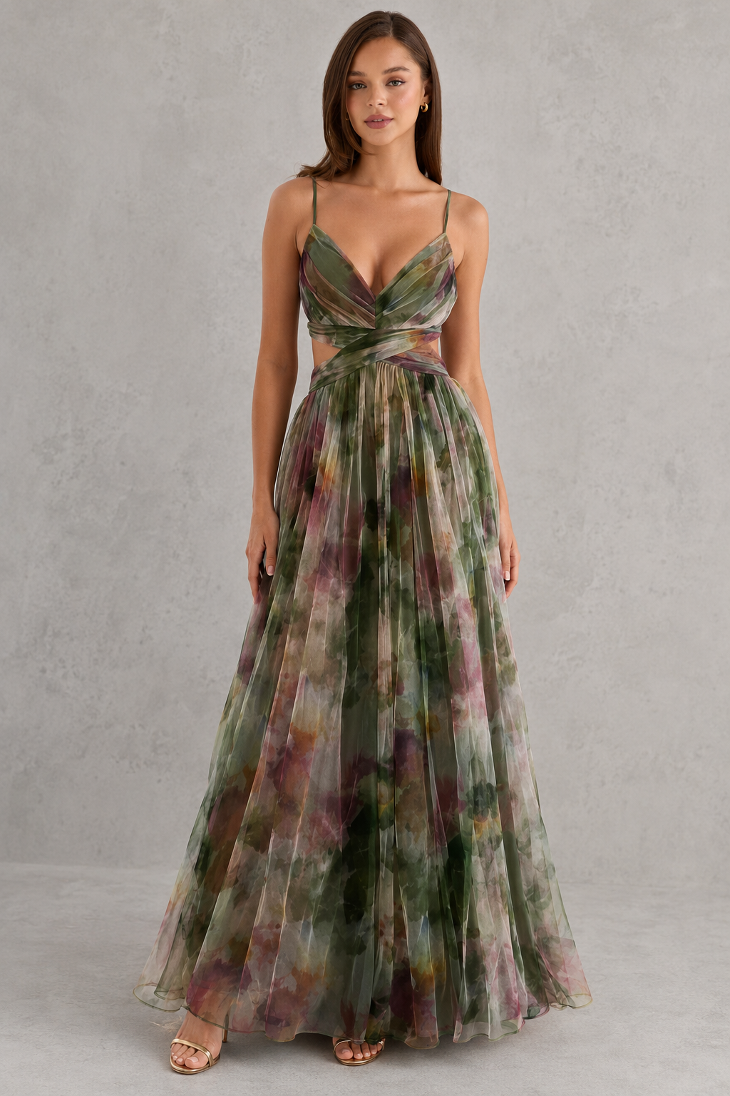 Womenโs floral maxi dress by Klyne Studios featuring a flowing full-length silhouette, adjustable tie-back detail, lightweight breathable fabric, and relaxed fit for warm-weather styling.