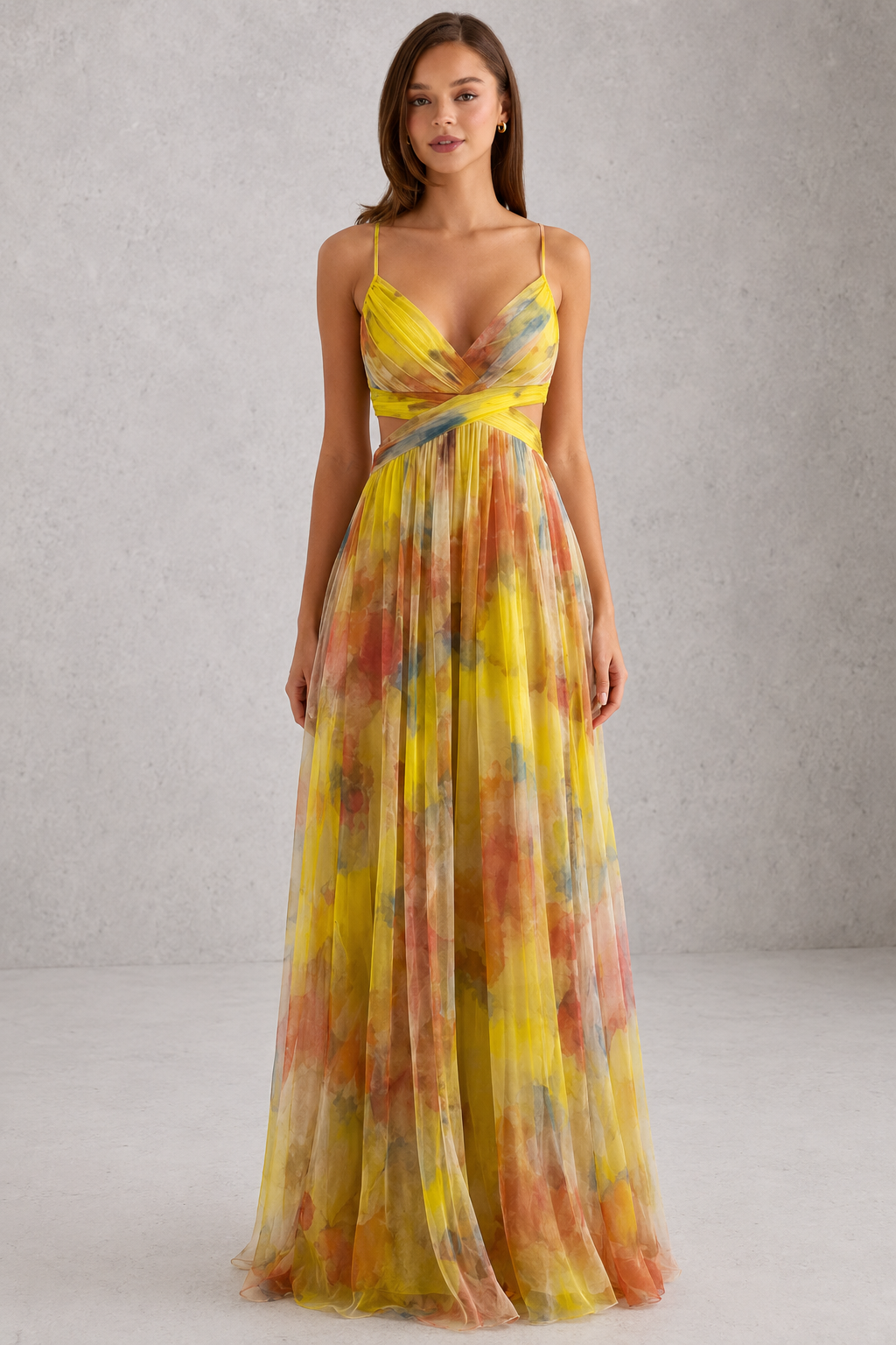 Womenโs floral maxi dress by Klyne Studios featuring a flowing full-length silhouette, adjustable tie-back detail, lightweight breathable fabric, and relaxed fit for warm-weather styling.