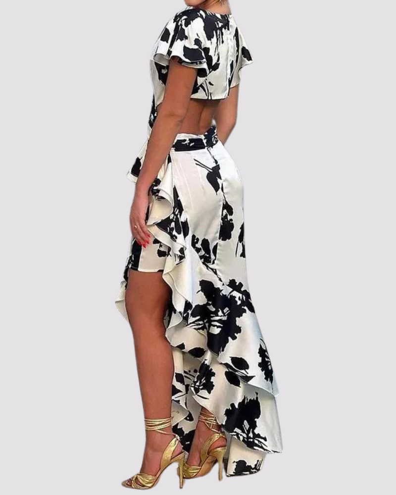 Womenโs floral maxi summer dress featuring an all-over floral print, fit-and-flare silhouette, and flowing flared skirt. Made from a soft breathable fabric blend for lightweight comfort and easy movement.