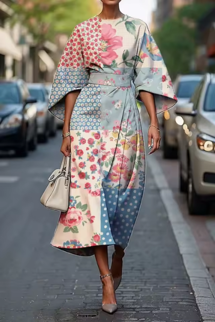 Women’s floral midi dress with flowing silhouette for summer and evening events