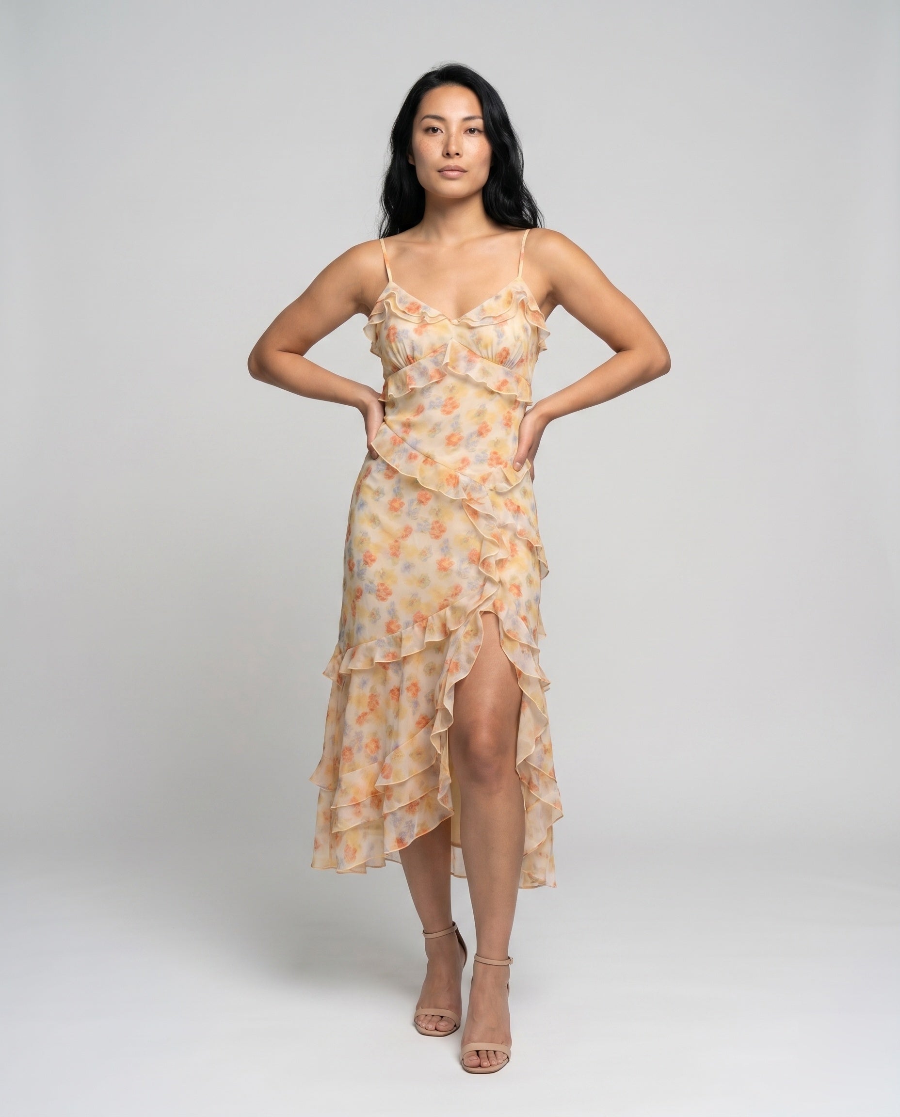 Women’s floral off-shoulder midi dress featuring delicate ruffle detailing, a flowing silhouette, and lightweight sheer fabric, ideal for summer occasions, vacations, and warm-weather styling.