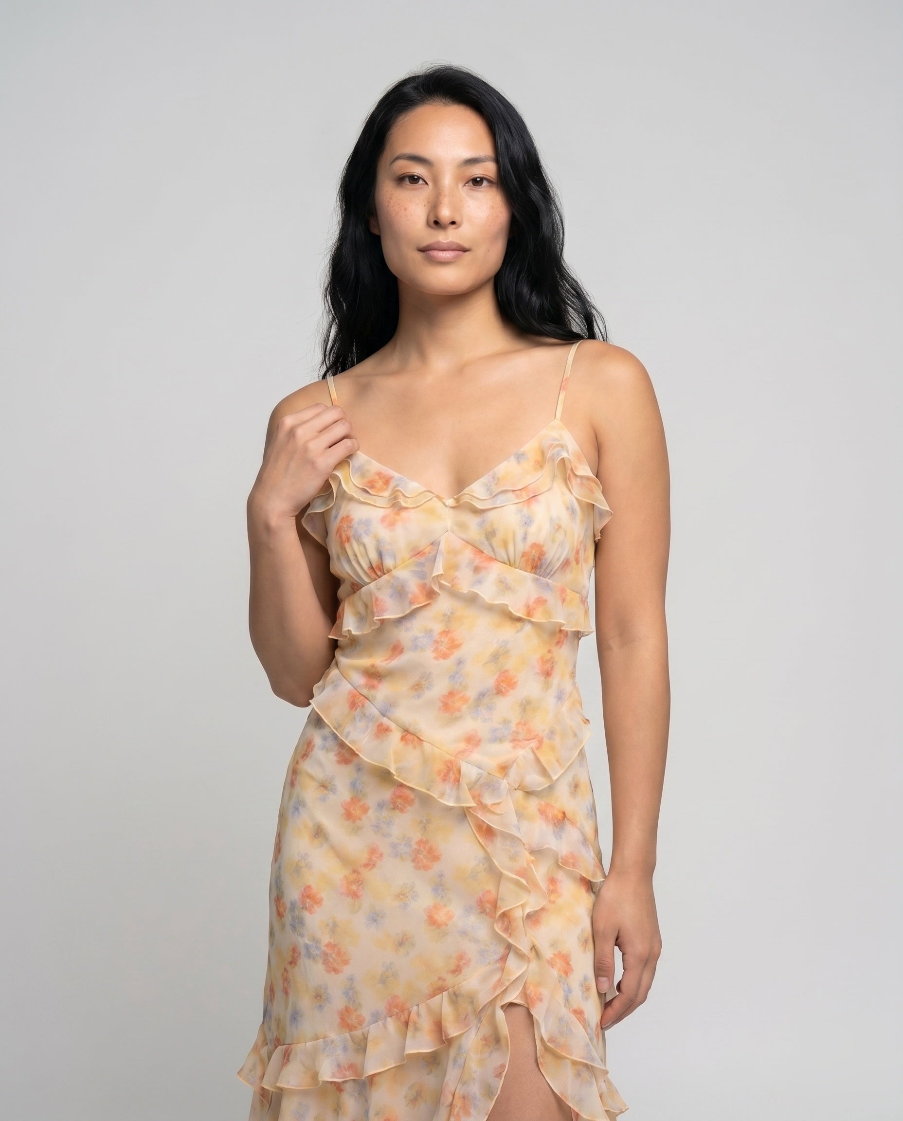Women’s floral off-shoulder midi dress featuring delicate ruffle detailing, a flowing silhouette, and lightweight sheer fabric, ideal for summer occasions, vacations, and warm-weather styling.