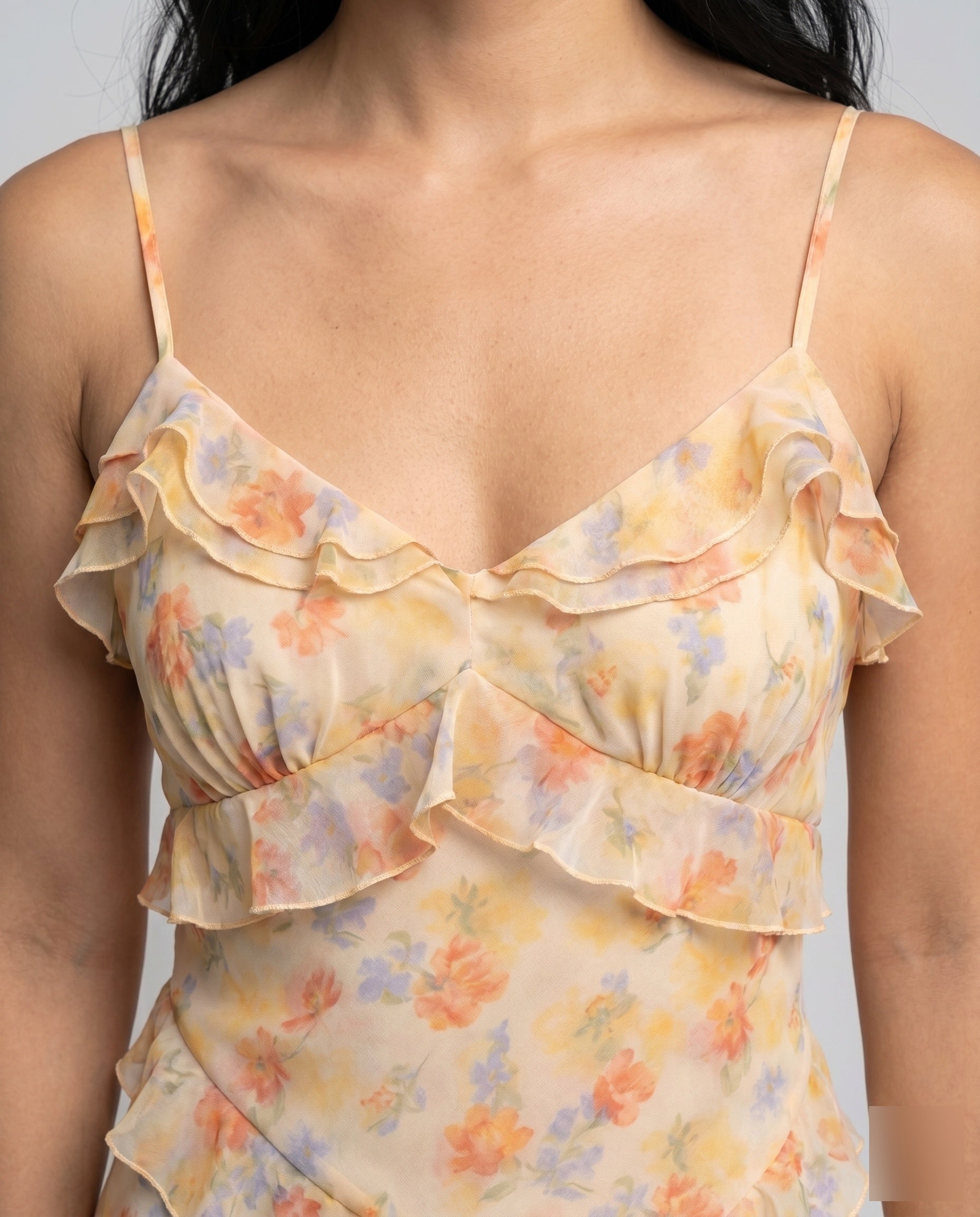Women’s floral off-shoulder midi dress featuring delicate ruffle detailing, a flowing silhouette, and lightweight sheer fabric, ideal for summer occasions, vacations, and warm-weather styling.