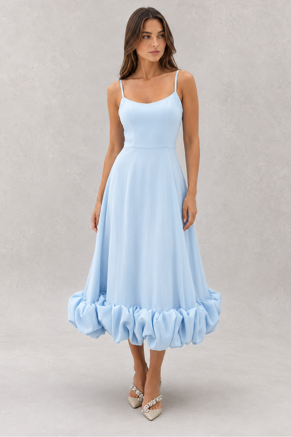 Women's flowing midi dress with a defined waist, lightweight breathable fabric, and graceful skirt silhouette, ideal for everyday wear, events, and special occasions.