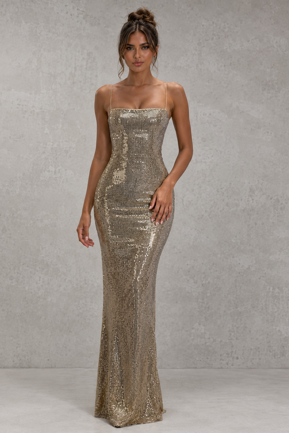 Womenโs gold sequin maxi dress with straight neckline, adjustable lace-up back and elegant column silhouette for evening and formal occasions.