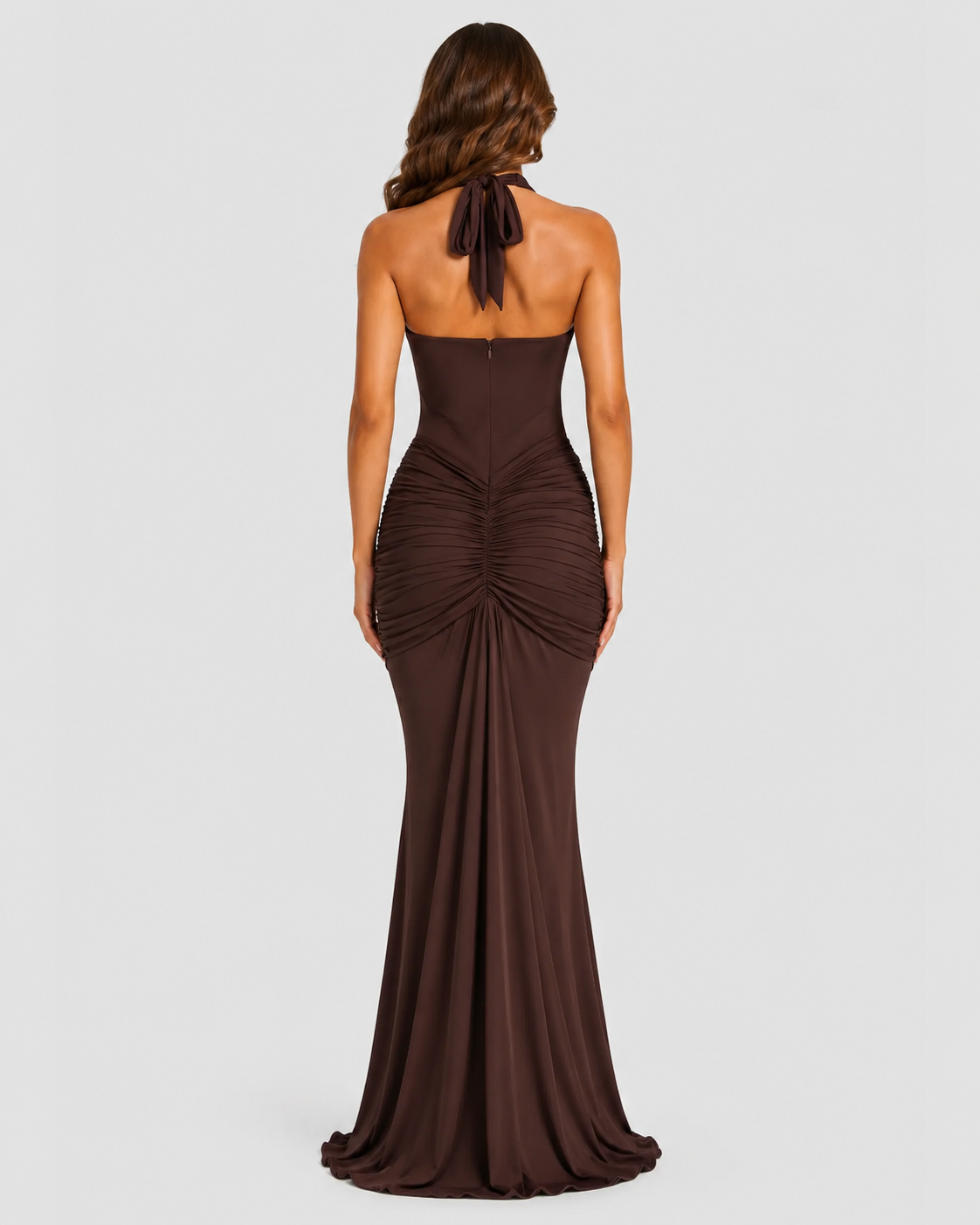 Womenโs halter maxi dress in soft stretch jersey featuring a plunge neckline with U-wire detail, gathered draping, a flowing full-length skirt with train, and a dramatic front draped panel for an elegant occasionwear look.