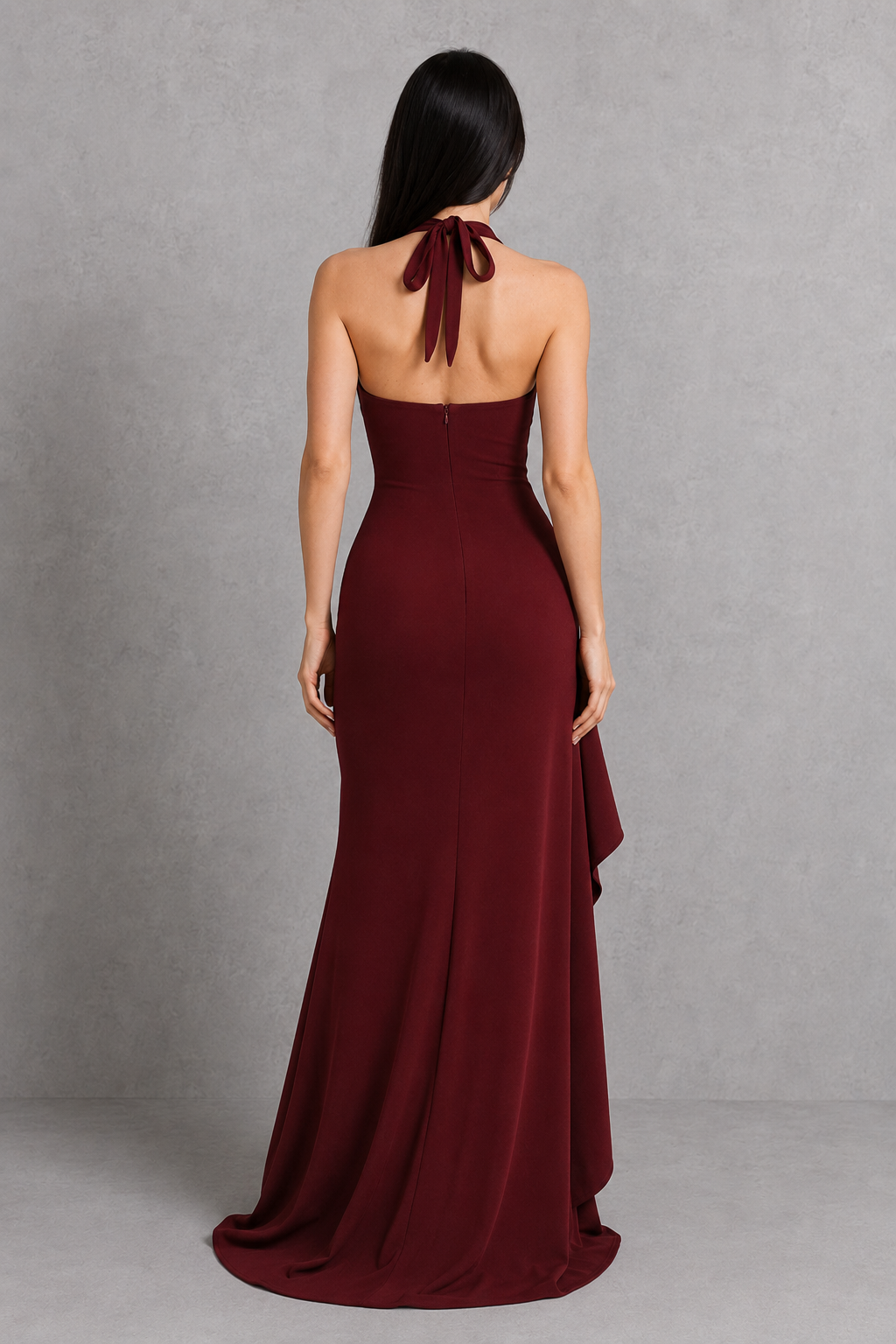 Women's halter maxi dress with plunging neckline, cascading ruffle detail, thigh-high split, and fitted stretch crepe silhouette for evening and formal occasions.