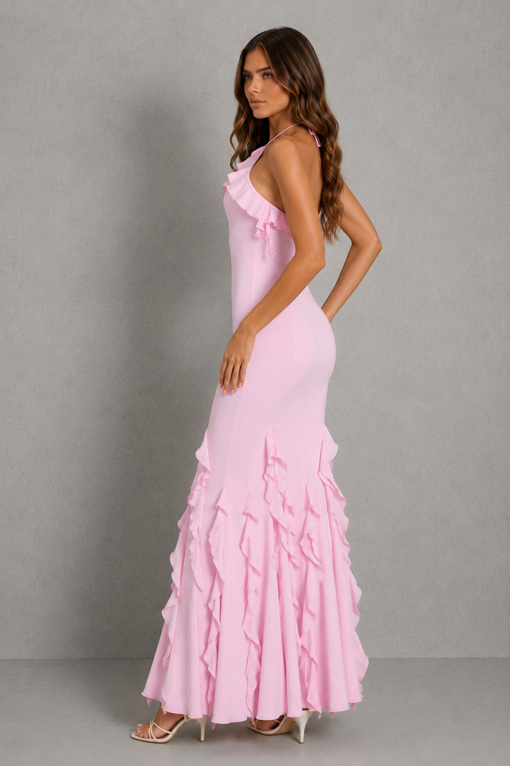 Women’s halterneck ruffle fishtail maxi dress with cascading ruffle detail, sculpting princess seams, and a figure-flattering bodycon silhouette.
