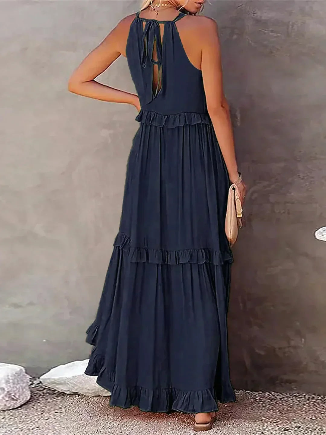 Women’s halterneck ruffle maxi dress with pockets and flowing silhouette
