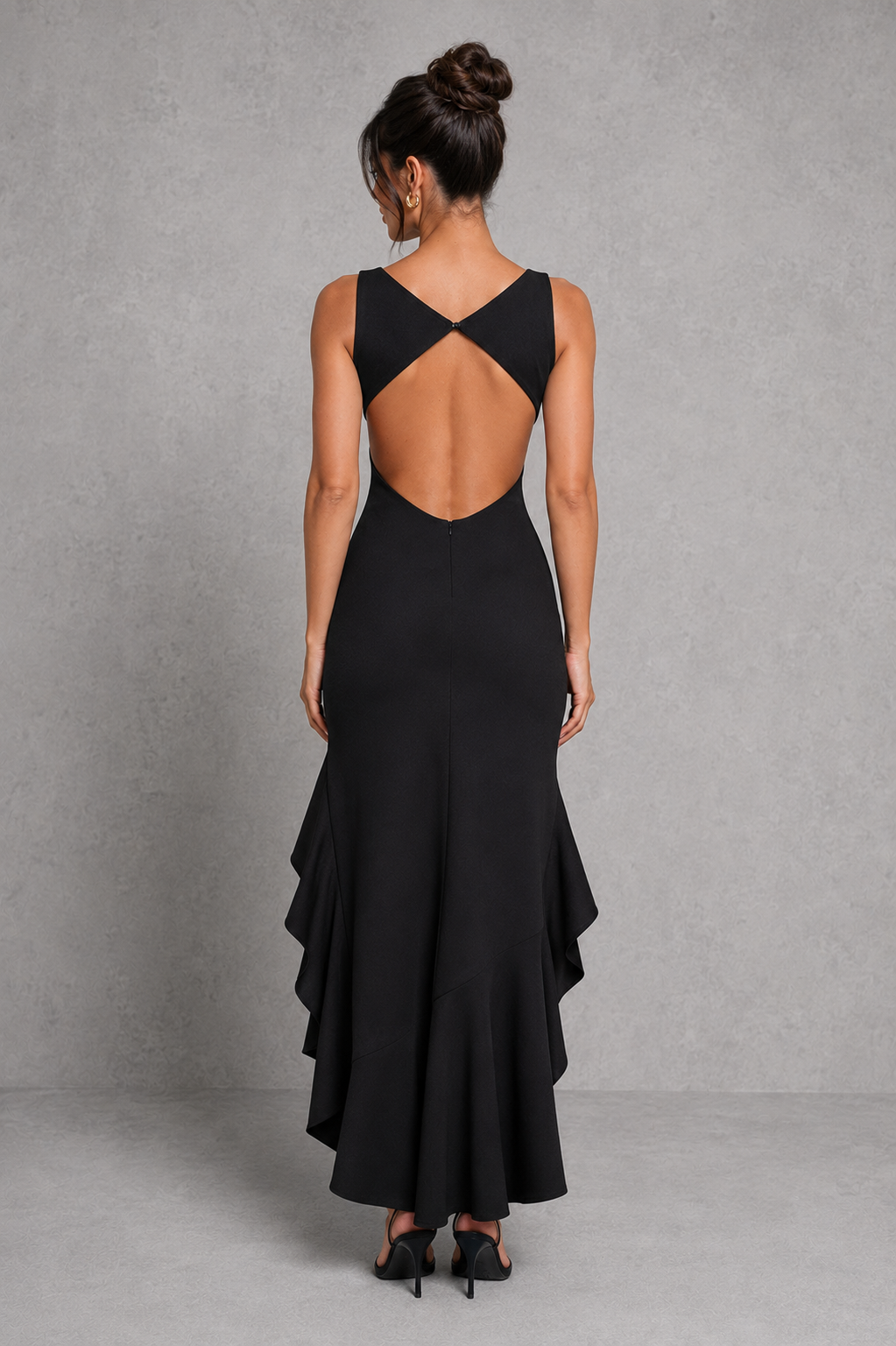 Women’s high neck maxi dress in premium stretch crepe with a figure-hugging silhouette, dramatic low back with mesh panel detailing, double frill skirt, and thigh-high split. Elegant formal evening gown designed to flatter natural curves with graceful movement and sophisticated style.