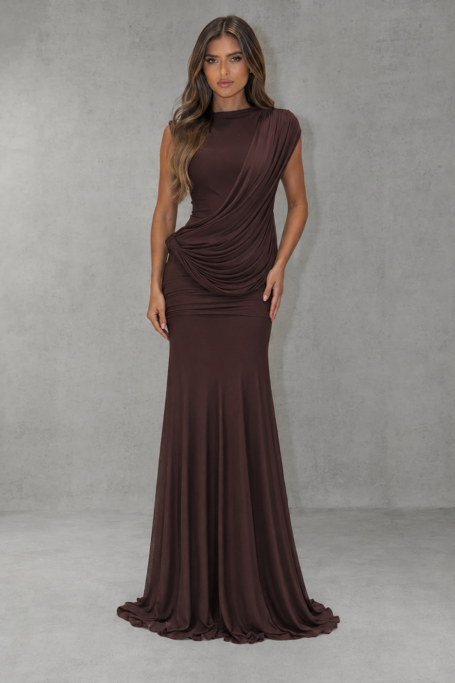 Womenโs high neck mesh maxi dress with diagonal sash detail, ruched hips, asymmetric open back and flowing flared skirt.