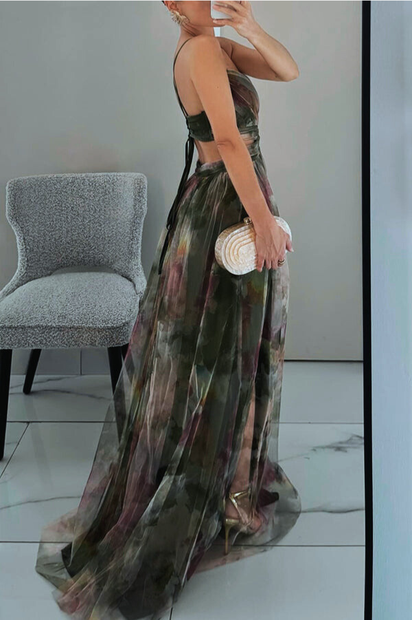 Women’s layered formal dress with flowing silhouette and soft painterly colors