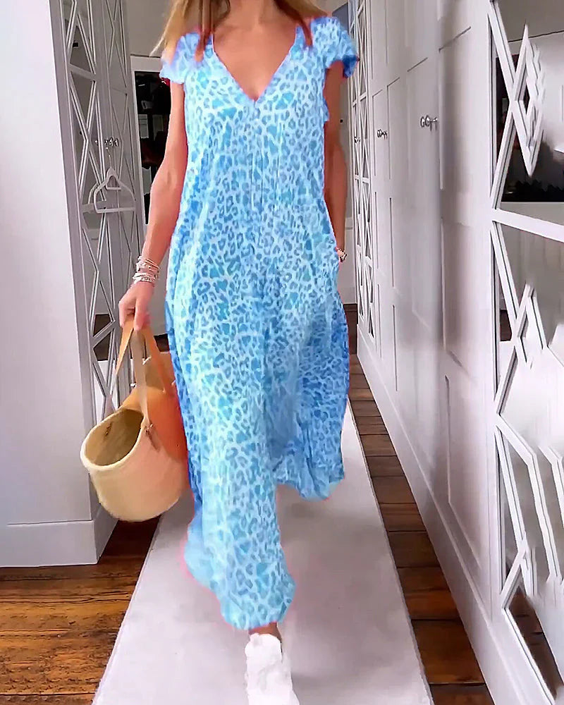 Womenโs leopard print V-neck short sleeve maxi dress with flowy relaxed fit for casual and stylish wear