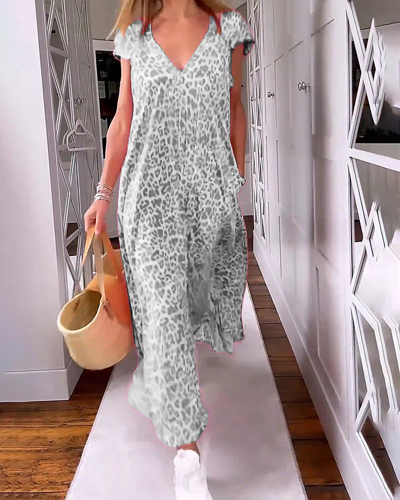 Womenโs leopard print V-neck short sleeve maxi dress with flowy relaxed fit for casual and stylish wear