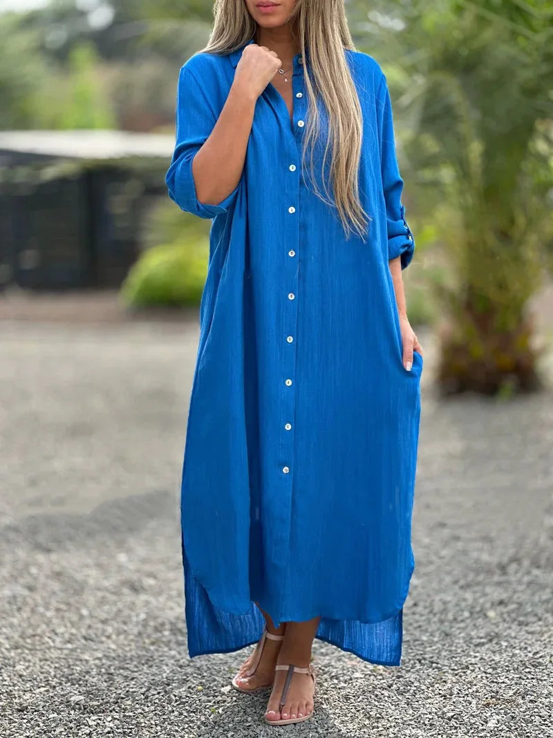 Women's light pink shirt dress with button front, relaxed fit, and casual feminine style