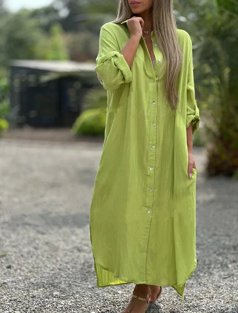 Women's light pink shirt dress with button front, relaxed fit, and casual feminine style
