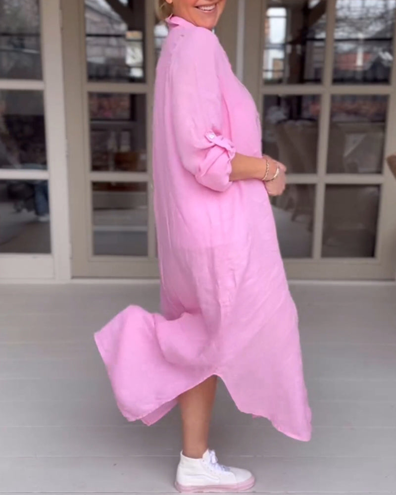 Women's light pink shirt dress with button front, relaxed fit, and casual feminine style