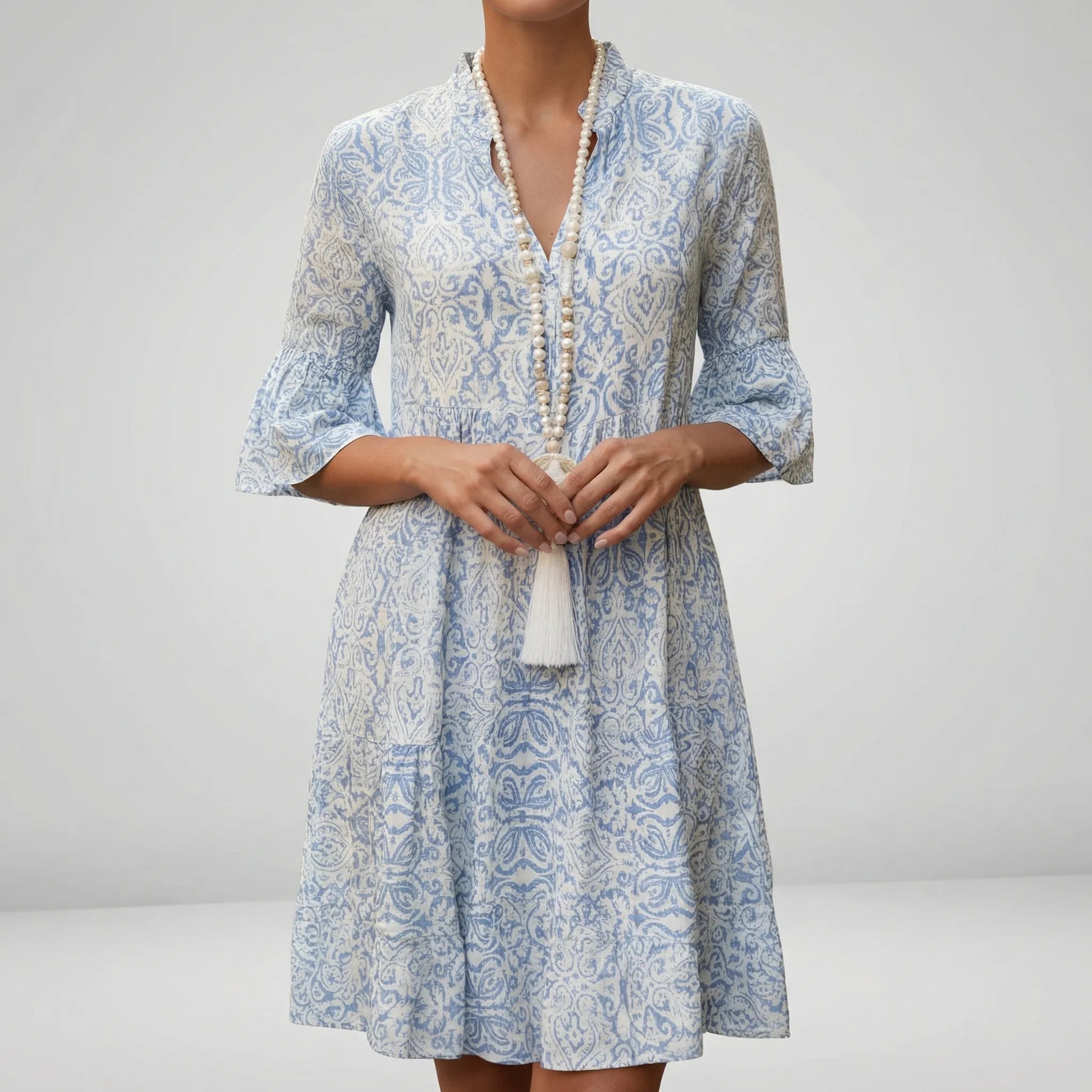 Women’s lightweight boho-inspired short-sleeve mini dress with V-neck