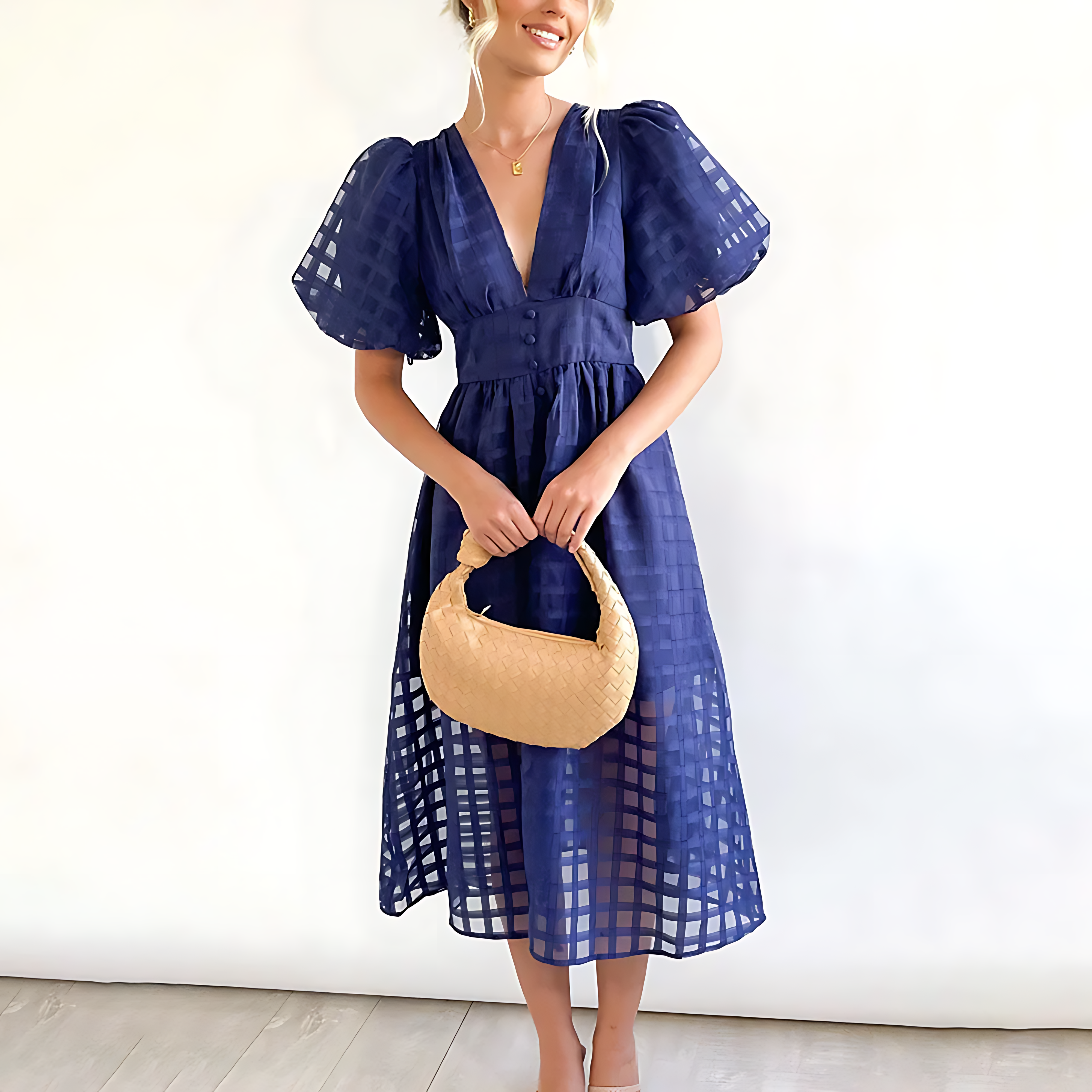 Women’s midi dress with structured bodice and flowing skirt
