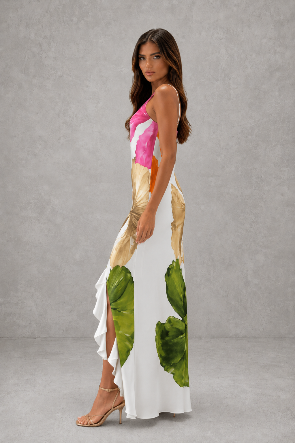 Womenโs one-shoulder floral maxi dress with oversized botanical print, flowing silhouette and feminine ruffle hem.