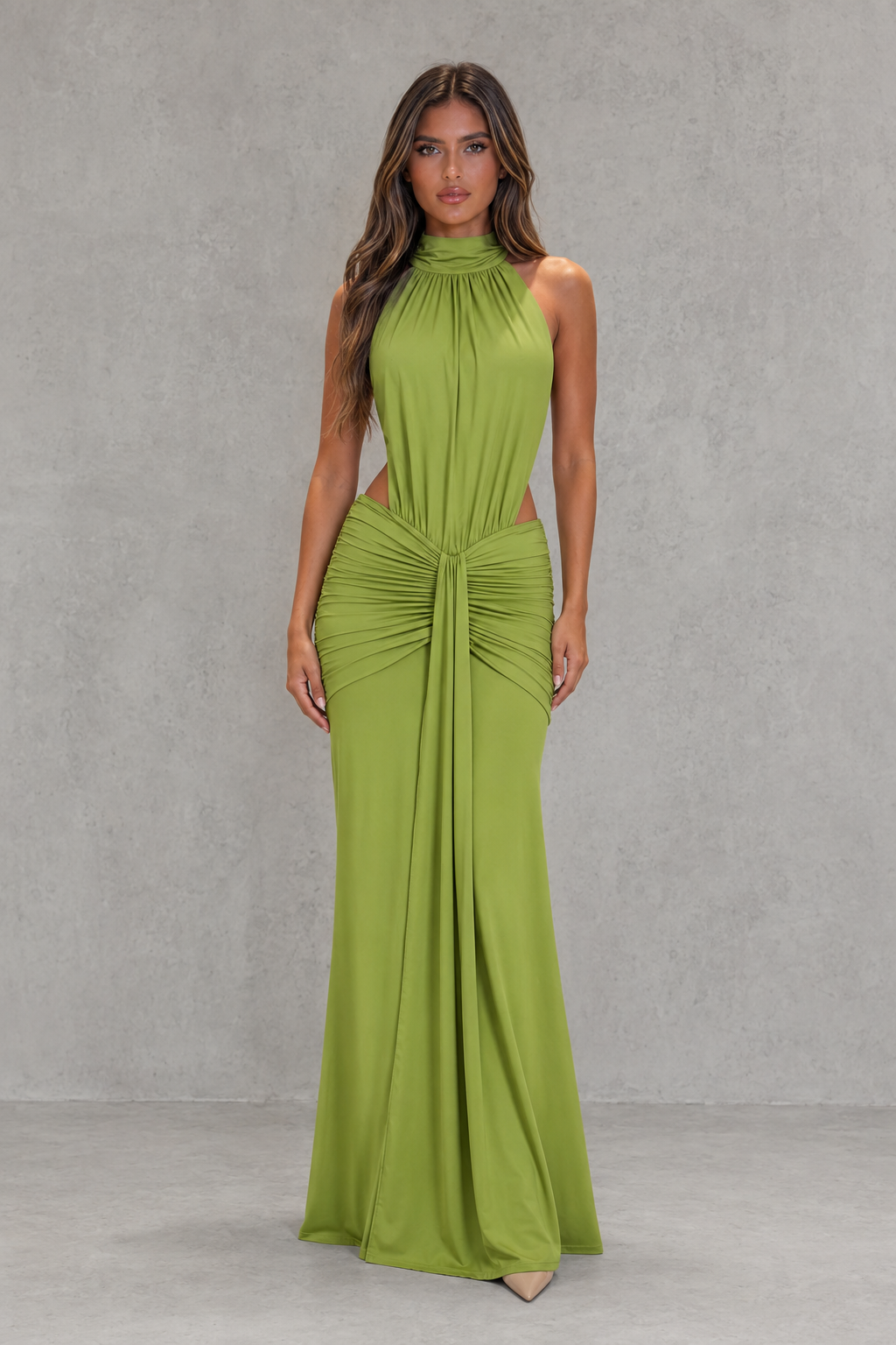 Women's open back mermaid maxi dress in smooth stretch fabric featuring a high neckline, fitted ruched silhouette, dramatic open back, and flowing mermaid skirt for evening and formal occasions.